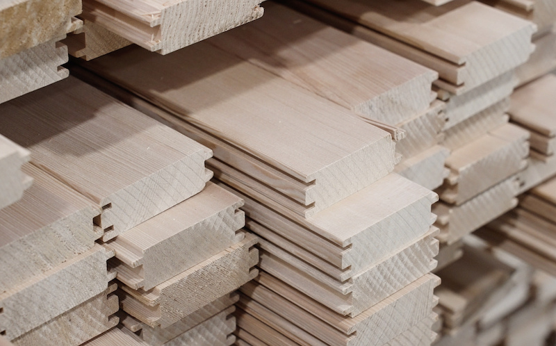 Stacks of raw solid wood moulding