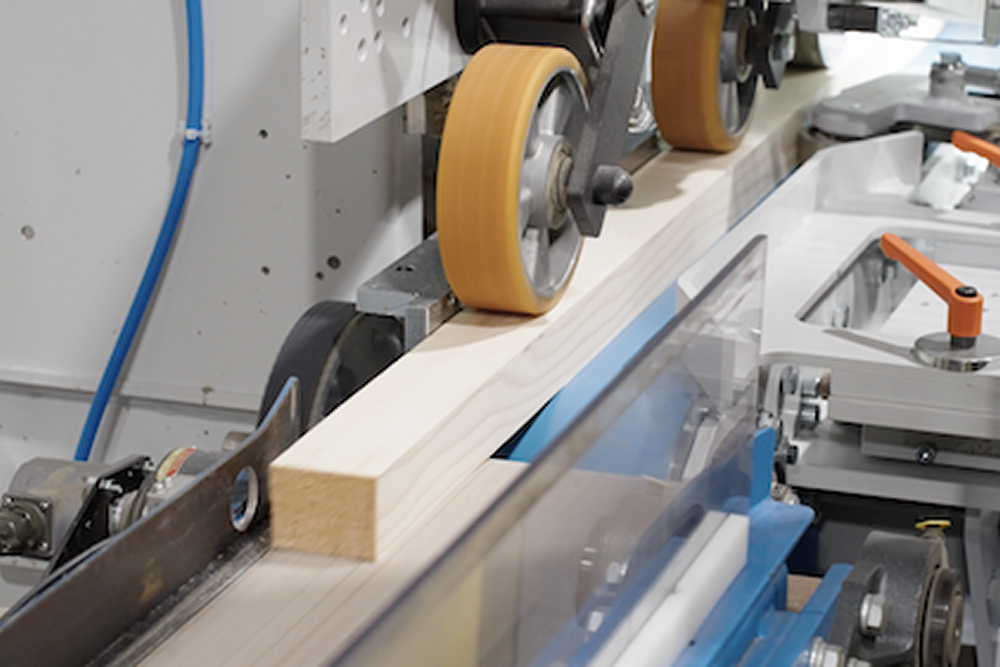 raw material on rollers prepped for our pre-finishing machine